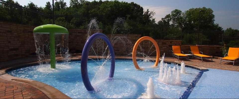 View of the kiddie splash area with fountains and interactive sprinklers at the Hampton Inn Pigeon Forge on Teaster Lane