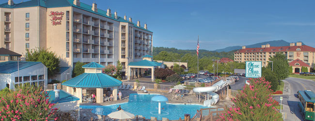 View of the Main Entrance of the Music Road Hotel with Water Park with Water Slide and Lazy River Wide