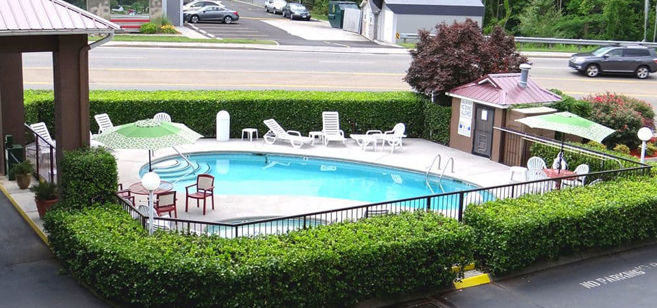 View of the Seasonal Outdoor Pool at the Baymont Inn and Suites Pigeon Forge Tn