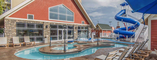 View of the Outdoor Lazy River and Water Slide at the Clarion Inn in Pigeon Forge Wide