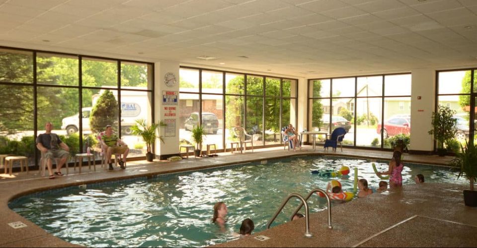 View of the Indoor Heated Pool with glass enclosure at the Country Cascades in Pigeon Forge Tn