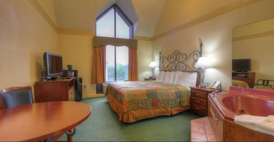 View of the King Bedroom with an in-room Jacuzzi Tub at the Country Cascades Country Tower in Pigeon Forge Tn