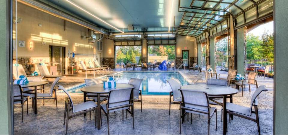 View from the Indoor Pool with open bay doors to the Outside Pool at the Marriott Courtyard Pigeon Forge