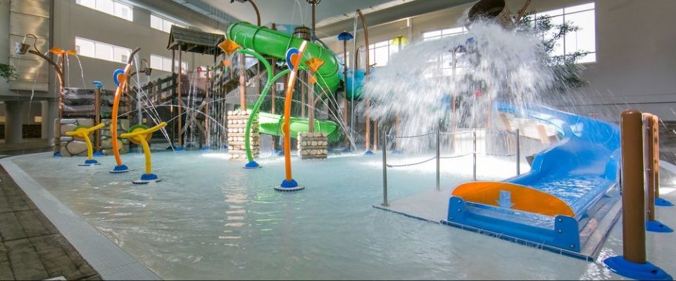 View of the Zero Entry access and 3 Water Slides at the Indoor Water Park at Holiday Inn Express Gatlinburg Downtown