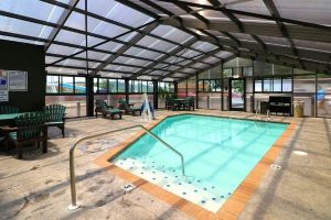Indoor Pool with sunlight glass roof Howard Johnson Pigeon Forge 600