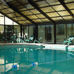 Indoor Pool enclosed in a glass room Heated at Colonial House Motel in Pigeon Forge