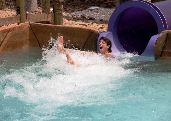 Big splash at the end of the Purple Enclosed body slide at Salamander Springs