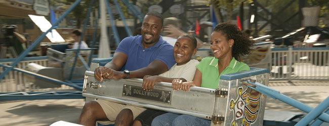 Family having a great time on the Scrambler at Dollywood wide