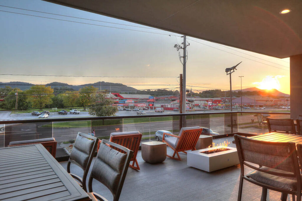 Outdoor Terrace with Firepit and Mountain Views at the Holiday Inn and Suites Pigeon Forge Conference Center 1200