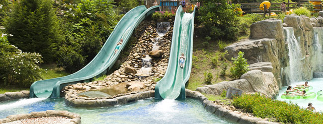 Two sliding down the smaller drop body water slide The Butterfly at Dollywood Splash Country wide