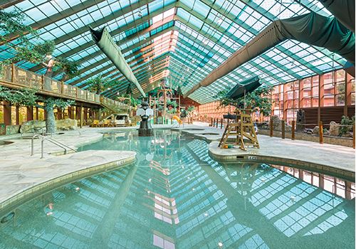 Large swimming pool with basketball goals