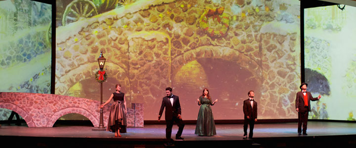 Cast on stage at the Smoky Mountain Palace performing at the Thomas Kinkade Christmas of Lights Show