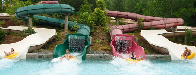 4 single tube enclosed and open water slides make up the Wild River Falls Water Slides at Splash Country wide